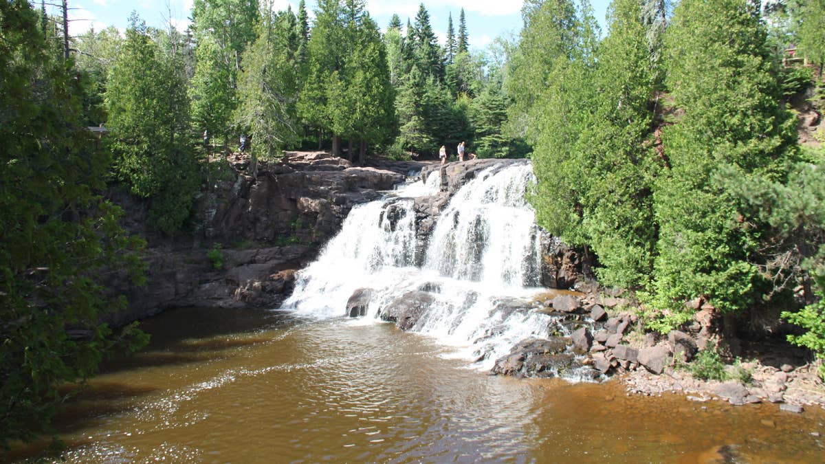 Hiker, 88, clings to tree over the Caribou River after 30-foot fall