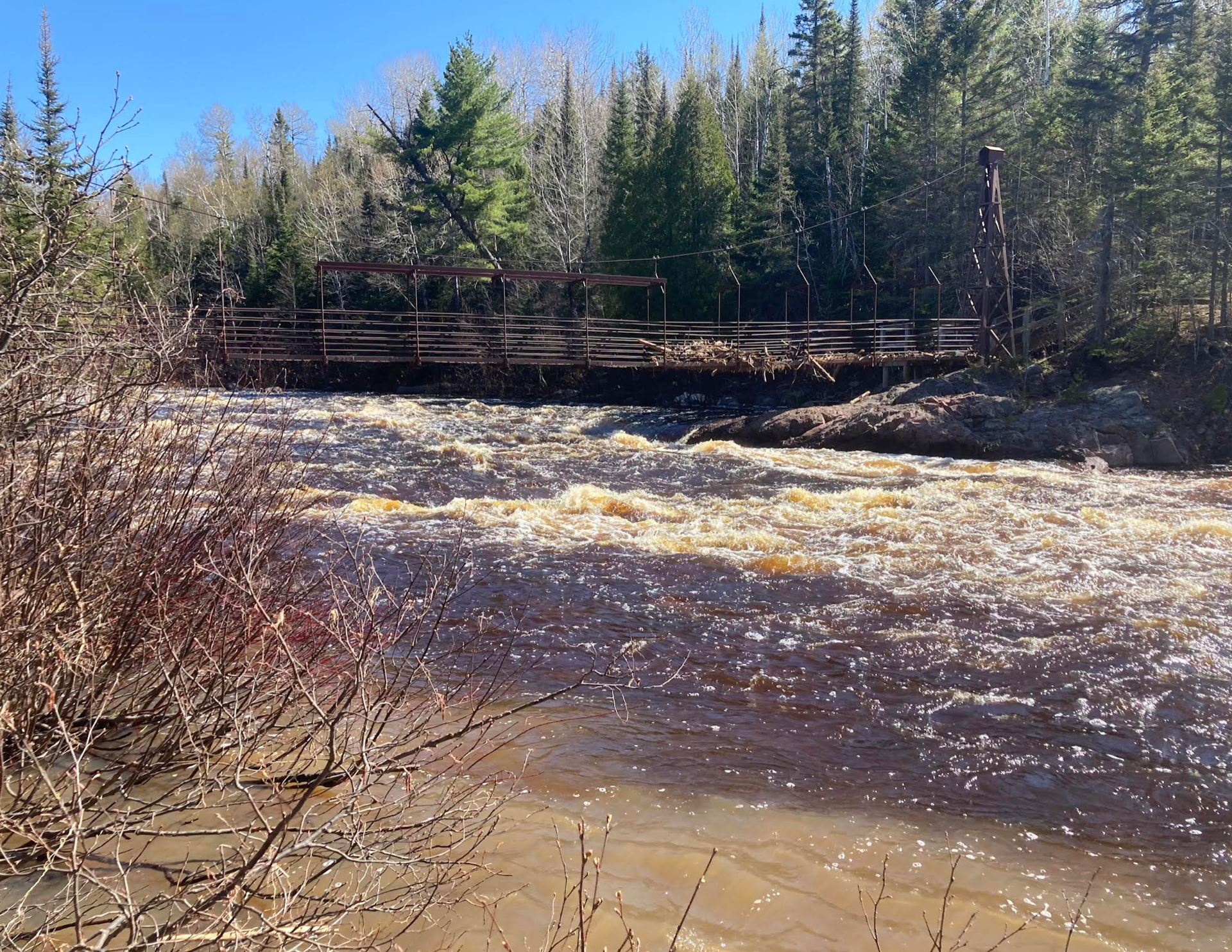 Bridge collapses due to extreme flooding at Tettegouche State Park ...
