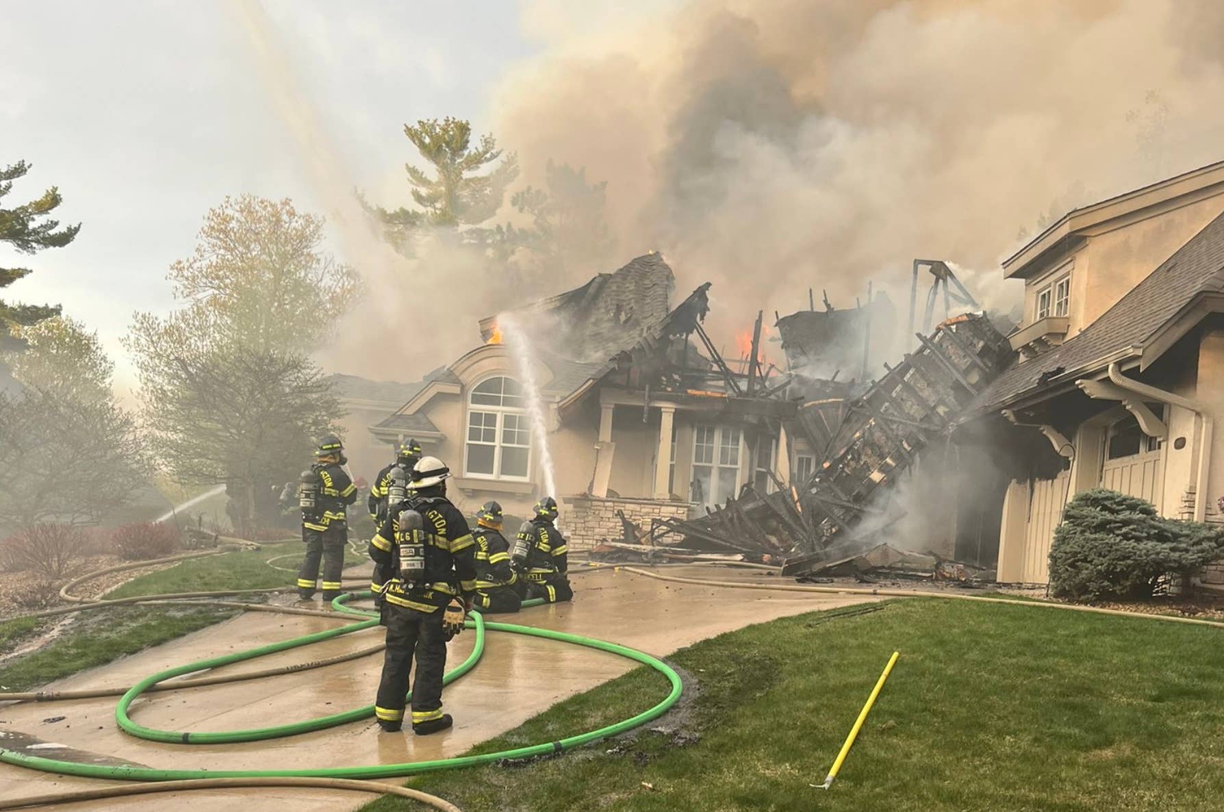 Bloomington house destroyed in massive fire; 2 firefighters injured ...