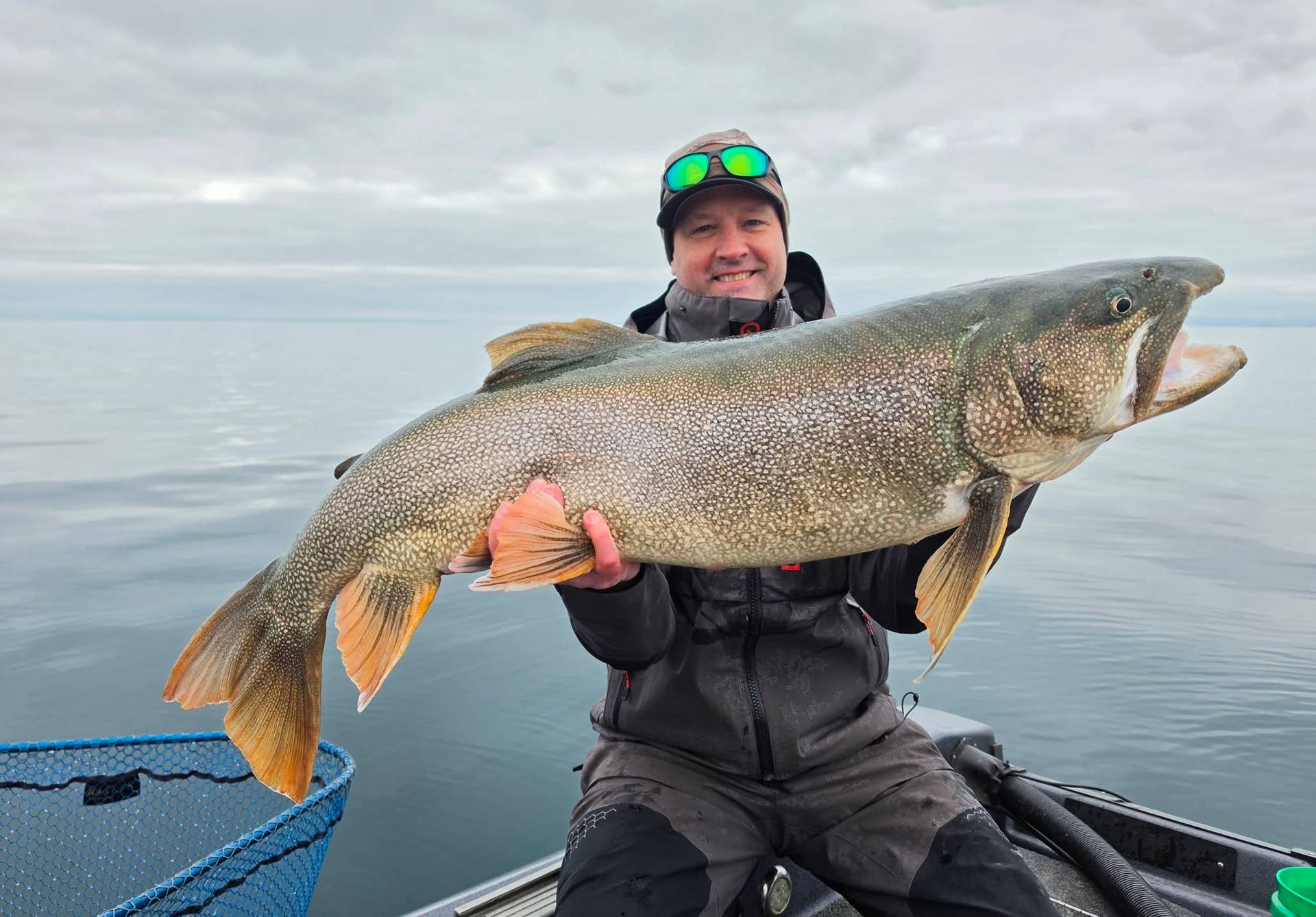 Twin Cities man catches record-breaking trout on Lake Superior