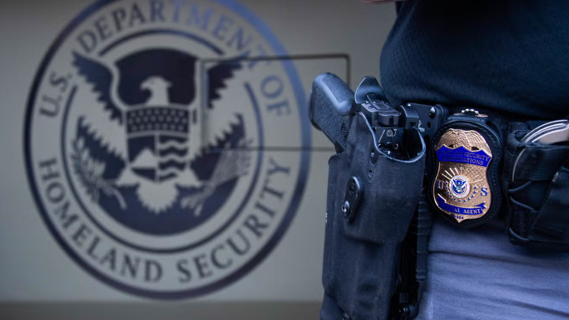 ICE agent accused of pointing gun on highway makes first court appearance