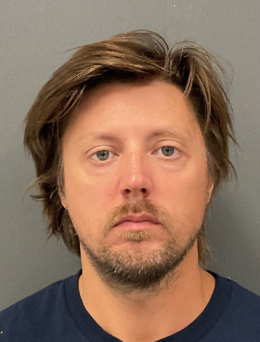Charges: Man clocked at 127 mph before fleeing deputy, drinking vodka after crash