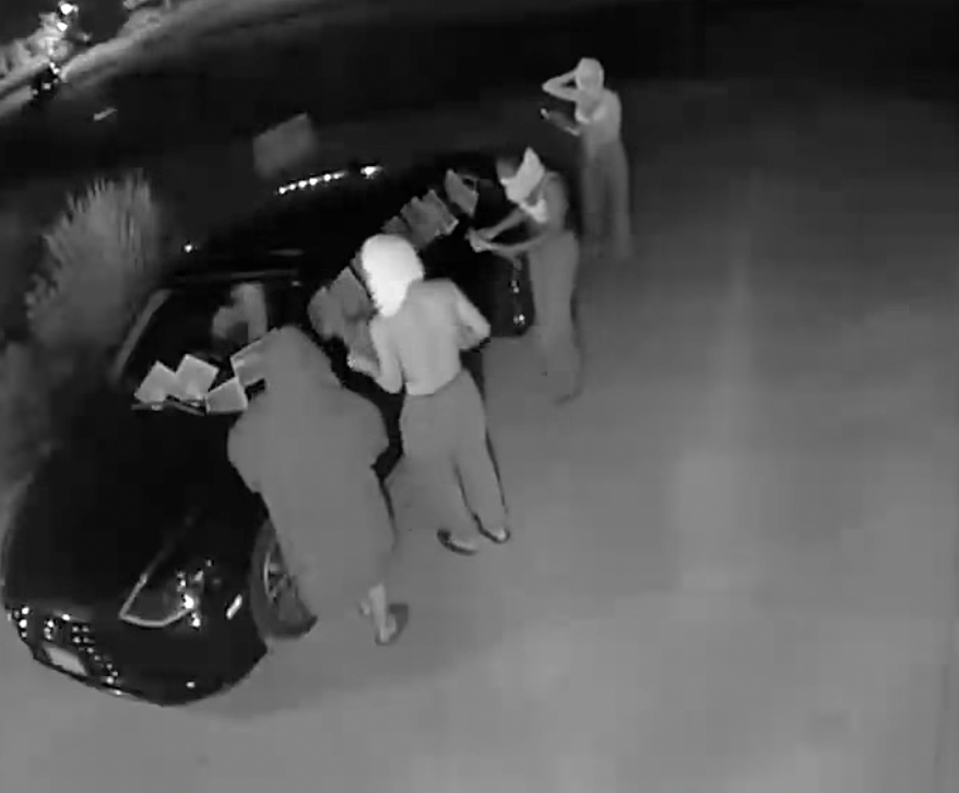 Masked group seen covering Blaine candidate's car with middle finger photos