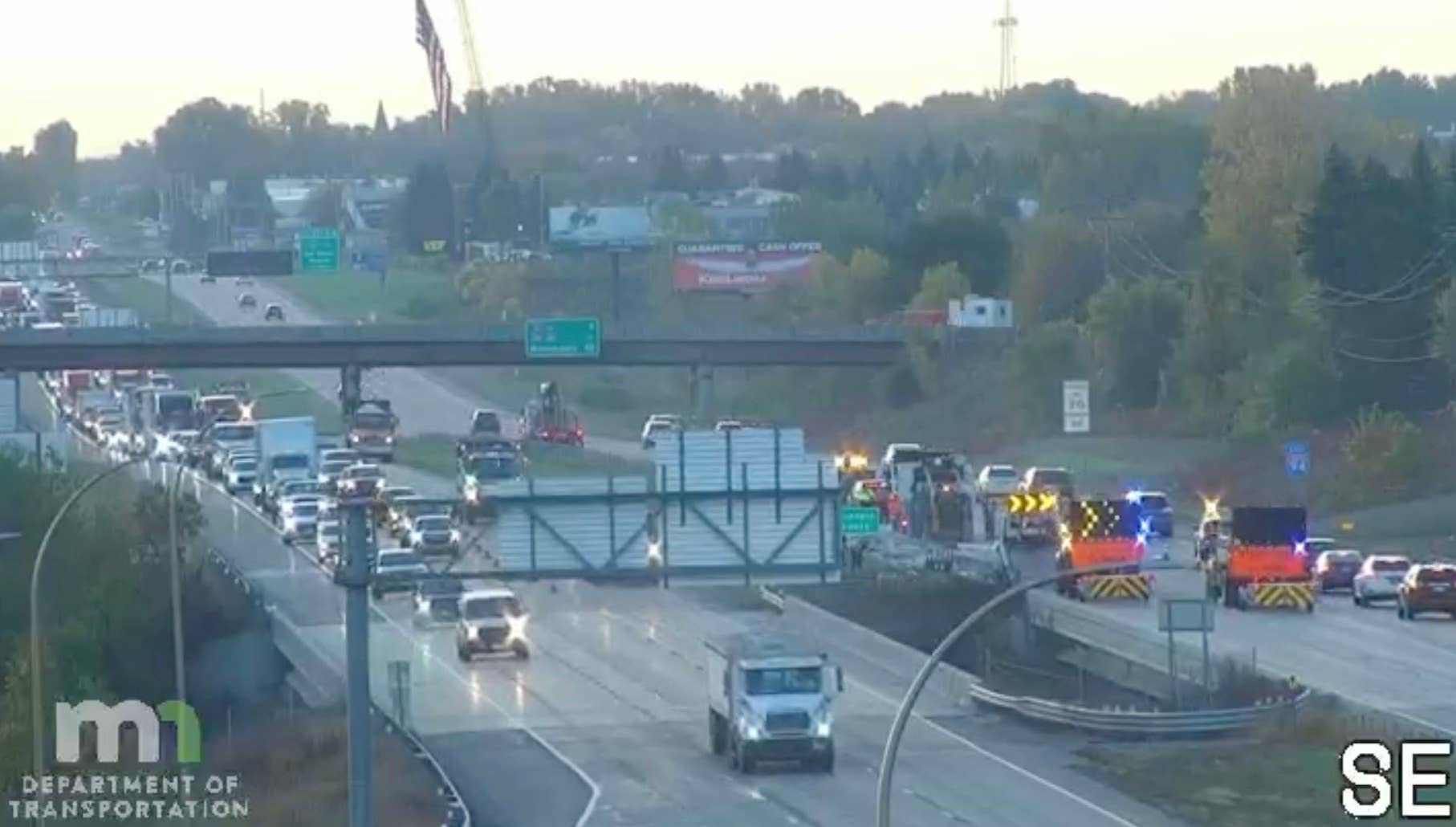 Lane closures on I-94 near Rogers after semi-trailer crashes, spills load