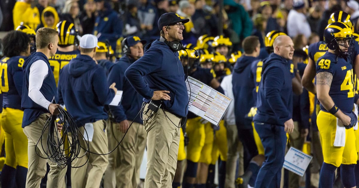 Jim Harbaugh calls Michigan president to say he's staying