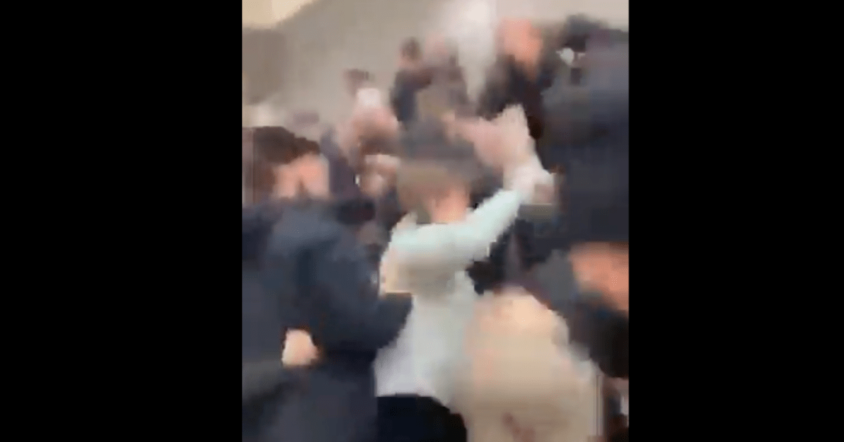 Video shows fight break out between man, students during playoff hockey ...