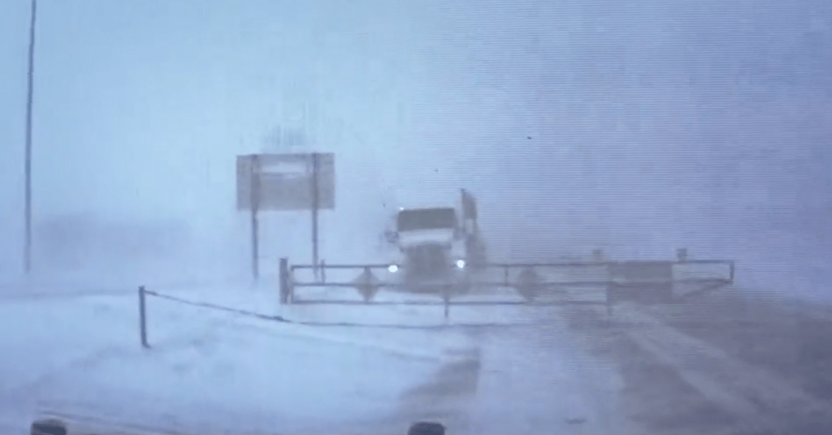 Watch Semi slams through closure gate on I94 during snowstorm in
