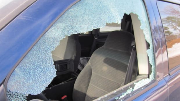 Car break-in, smashed window, car theft