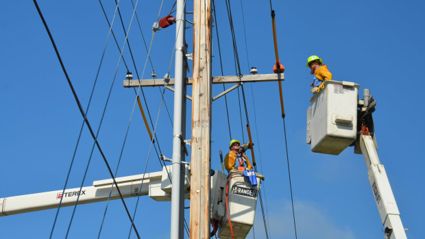unsplash polie linemen electric utility workers