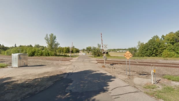 train crossing S Boardman Ave, New York Mills, Minnesota - August 2013 crop GSV