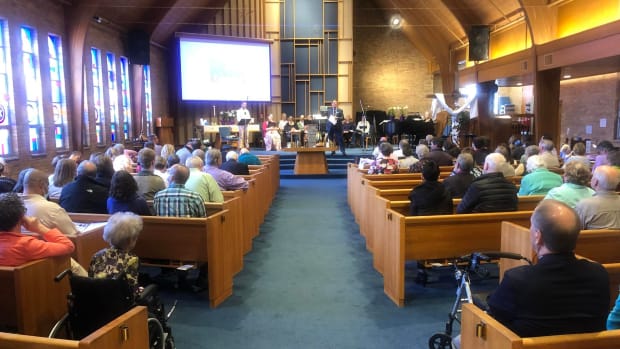 People gather at Peace United Church of Christ in Rochester, Minnesota on April 17, 2022.