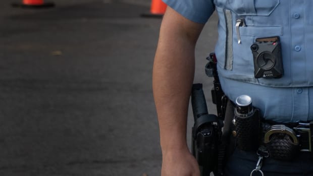 Flickr - minneapolis police officer close-up belt camera - Tony Webster