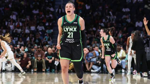 Jun 25, 2024; Belmont Park, New York, USA; Minnesota Lynx guard Kayla McBride (21) celebrates in the fourth quarter against the New York Liberty in the Commissioner’s Cup Championship game at UBS Arena. 
