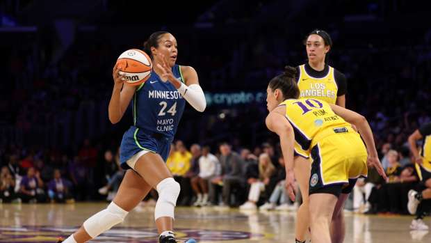 May 18, 2025; Los Angeles, California, USA; Minnesota Lynx forward Napheesa Collier (24) drives to the basket against Los Angeles Sparks guard Kelsey Plum (10) during the first quarter at Crypto.com Arena.