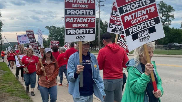 Picketing in Duluth on July 9, 2025.