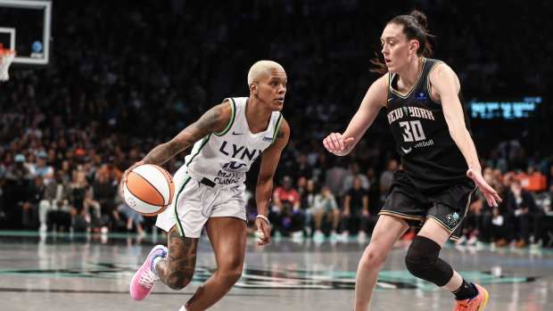 Oct 20, 2024; Brooklyn, New York, USA; Minnesota Lynx guard Courtney Williams (10) looks to drive past New York Liberty forward Breanna Stewart (30) in the second quarter during game five of the 2024 NBA Finals at Barclays Center.