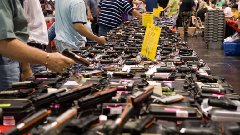 St. Paul man pleads guilty in illegal scheme to buy 97 guns