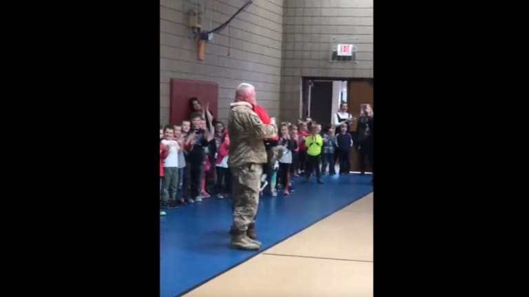 Minnesota military dad returns after year in Kuwait to surprise son at school