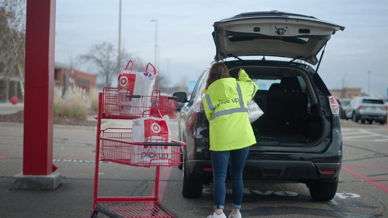 Target adding Starbucks, return items to drive-up service in select cities