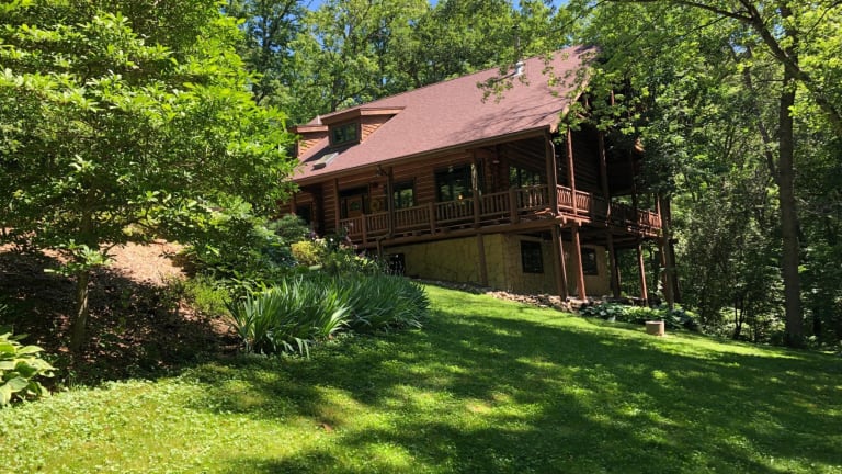 Gallery: Log home on 80 wooded acres on the market for $1.25M