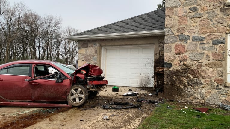 1 dead after car goes airborne, slams into side of a house in Zion Township