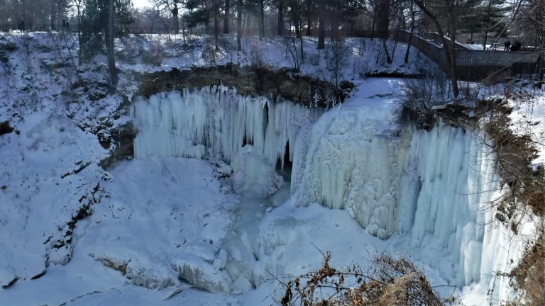Fire crews rescue injured woman from cave behind frozen Minnehaha Falls