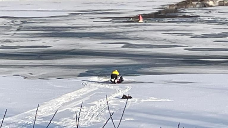 Man, dog rescued after falling through ice on Mississippi River