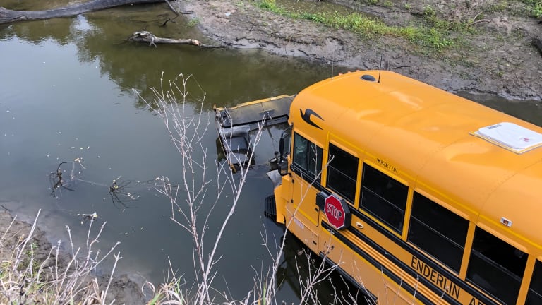 School bus carrying students plunges into river southwest of Fargo