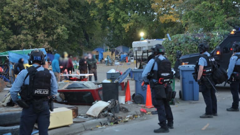 Minneapolis police, city employees clear out Near North homeless encampment