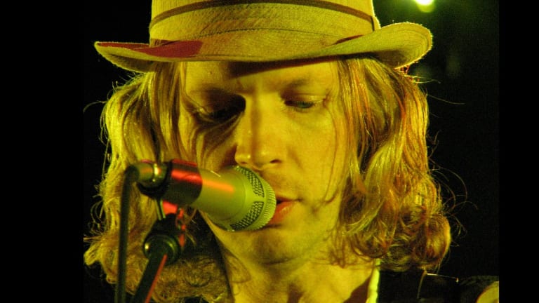 Beck drops out of Arcade Fire's Minneapolis show amid Win Butler controversy