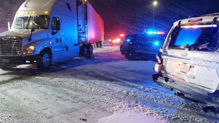 Semi-trailer crashes into two sheriff's squad cars