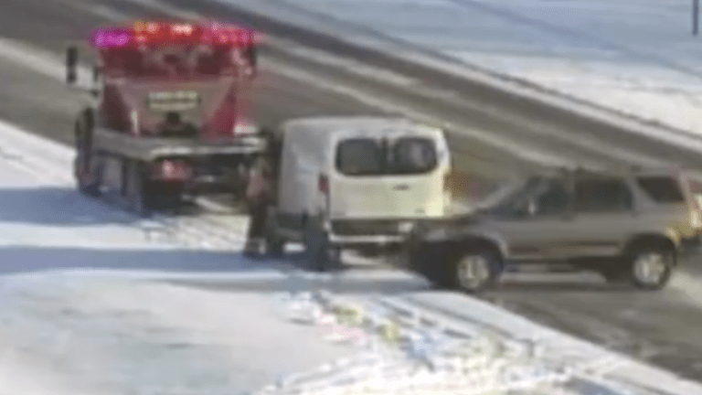 Traffic camera shows tow truck driver hit by vehicles on icy Minnesota freeway