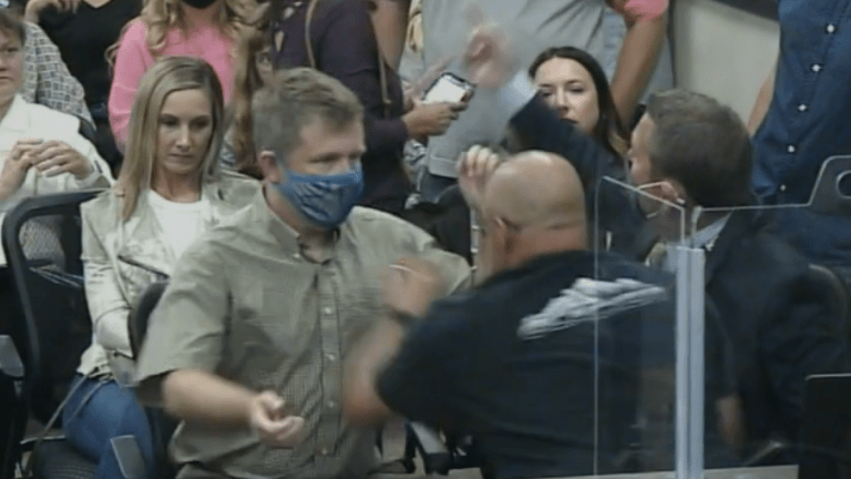 Man who grabbed mask wearer at school board meeting ordered to undergo anger management