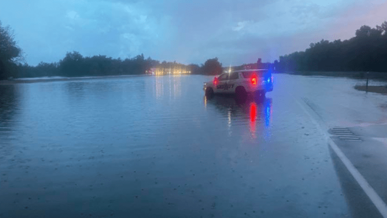 Big-time rain totals flood Highway 10 in central Minnesota