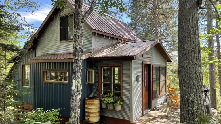 Gallery: Ely treehouse cabin for $209k is a salvaged materials masterpiece