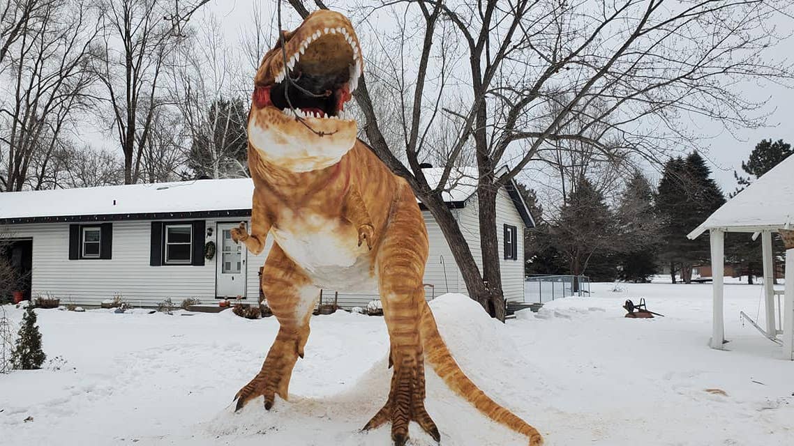 Minnesotan's giant T-rex snow sculpture wows visitors, passersby