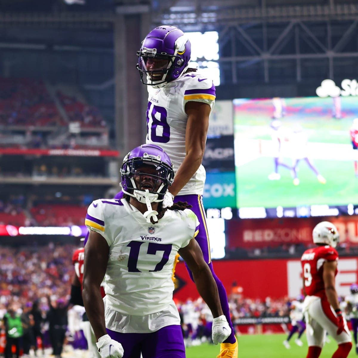 Minnesota Vikings wide receiver K.J. Osborn (17) warms up before