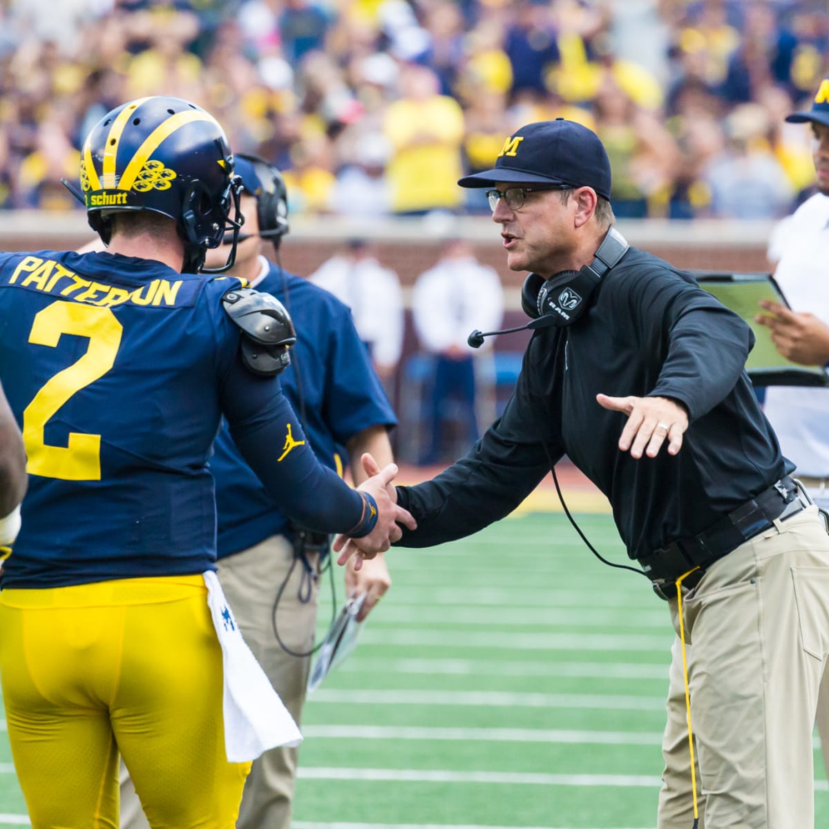 Michigan Wolverines' Jim Harbaugh interviewing with Minnesota Vikings