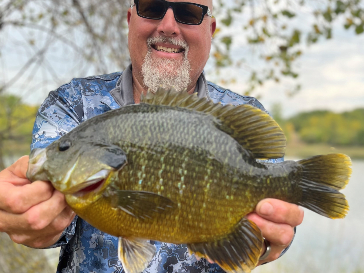 Angler catches record-tying hybrid sunfish on Green Lake - Bring