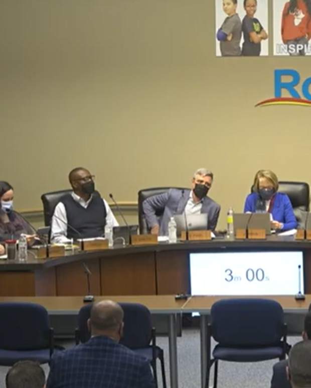 rochester school board meeting mask