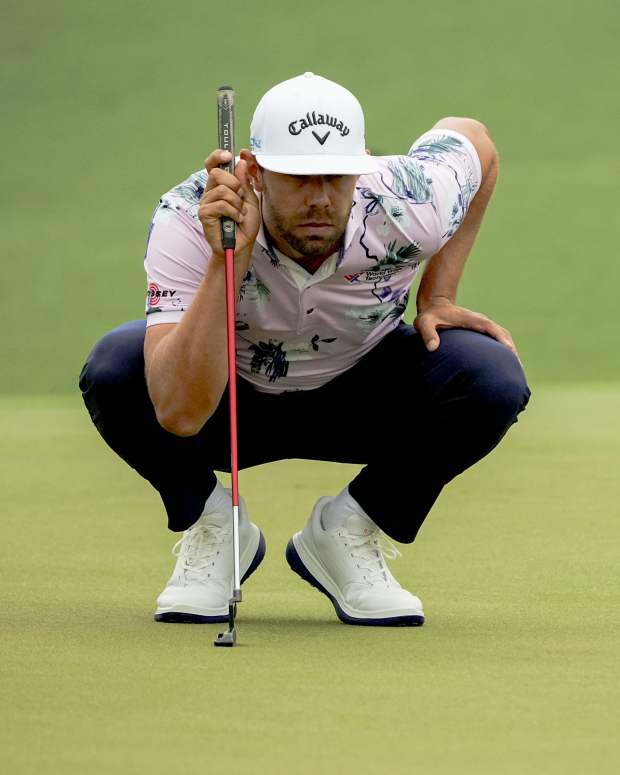 Apr 11, 2024; Augusta, Georgia, USA; Erik van Rooyen lines up his putt on the no. 2 green during the first round of the Masters Tournament.