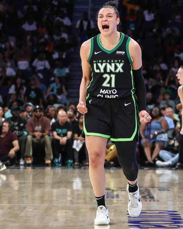 Jun 25, 2024; Belmont Park, New York, USA; Minnesota Lynx guard Kayla McBride (21) celebrates in the fourth quarter against the New York Liberty in the Commissioner’s Cup Championship game at UBS Arena. Mandatory Credit: Wendell Cruz-USA TODAY Sports  