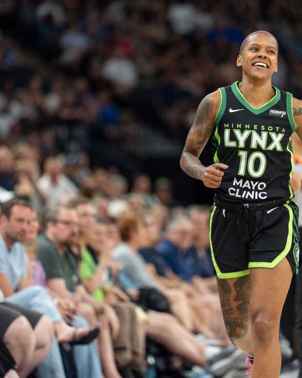 Jul 5, 2025; Minneapolis, Minnesota, USA; Minnesota Lynx guard Courtney Williams (10) smiles as the Minnesota Lynx lead late in the fourth quarter over the Golden State Valkyries in the fourth quarter at Target Center. Mandatory Credit: Matt Blewett-Imagn Images