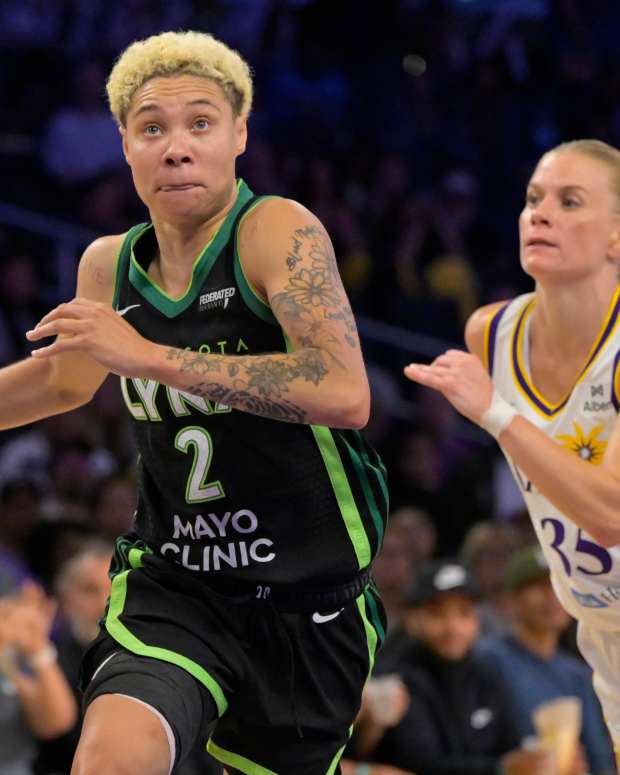 Jul 10, 2025; Los Angeles, California, USA; Minnesota Lynx guard Natisha Hiedeman (2) drives past Los Angeles Sparks guard Julie Vanloo (35) in the first half at Crypto.com Arena. Mandatory Credit: Jayne Kamin-Oncea-Imagn Images  