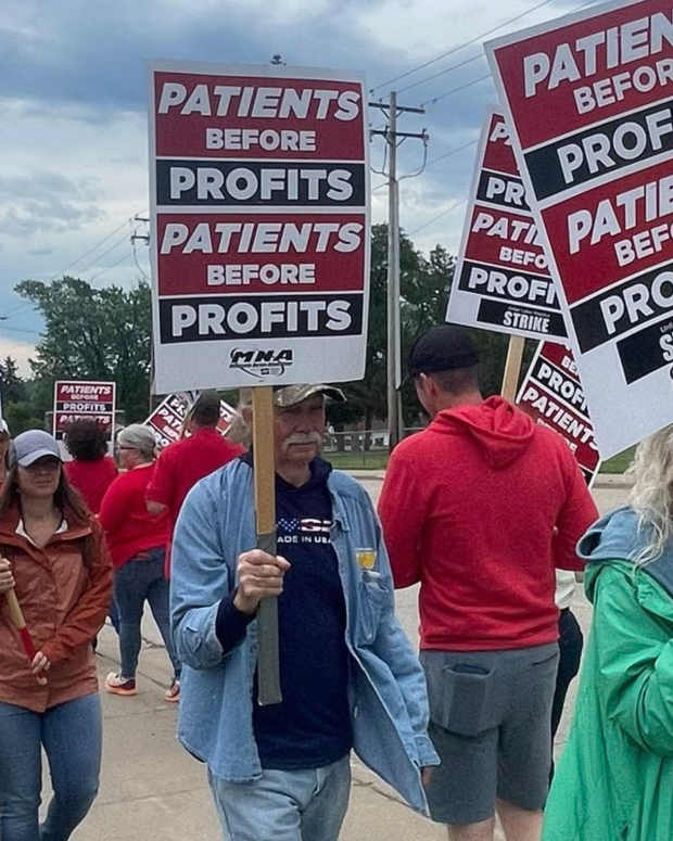 Picketing in Duluth on July 9, 2025.