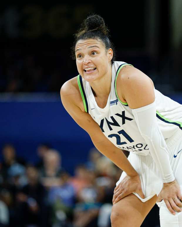 Jul 12, 2025; Chicago, Illinois, USA; Minnesota Lynx guard Kayla McBride (21) looks on during the second half of a WNBA game against the Chicago Sky at Wintrust Arena.