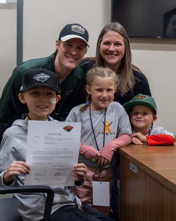 Weston Paszkiewicz signing a one-day contract with the Minnesota Wild, in partnership with the Make-A-Wish foundation