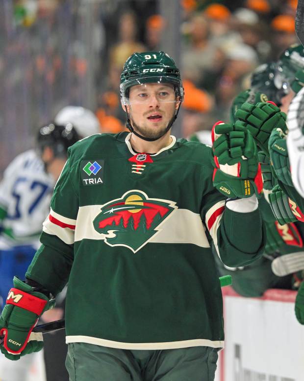 Nov 1, 2025; Saint Paul, Minnesota, USA; Minnesota Wild forward Vladimir Tarasenko (91) celebrates his power play goal against the Vancouver Canucks during the first period at Grand Casino Arena.