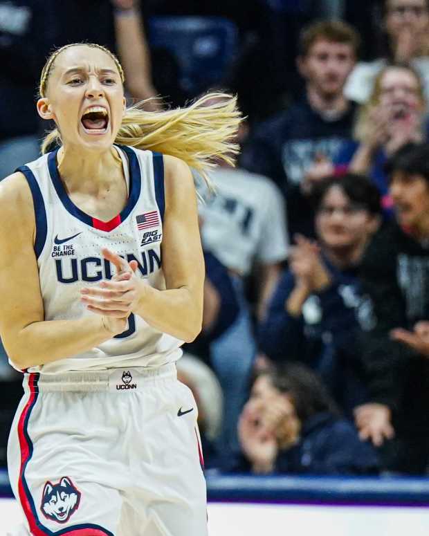 Nov 10, 2024; Storrs, Connecticut, USA; UConn Huskies guard Paige Bueckers (5) reacts after a basket against the South Florida Bulls in the first half at Harry A. Gampel Pavilion.