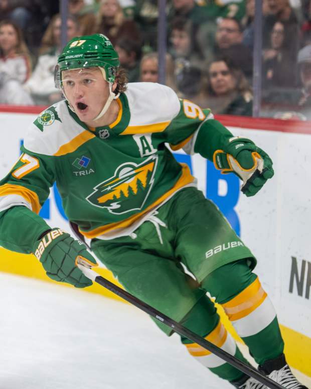 Minnesota Wild left wing Kirill Kaprizov brings the puck up ice against the Dallas Stars in the third period at Xcel Energy Center in St. Paul, Minn.